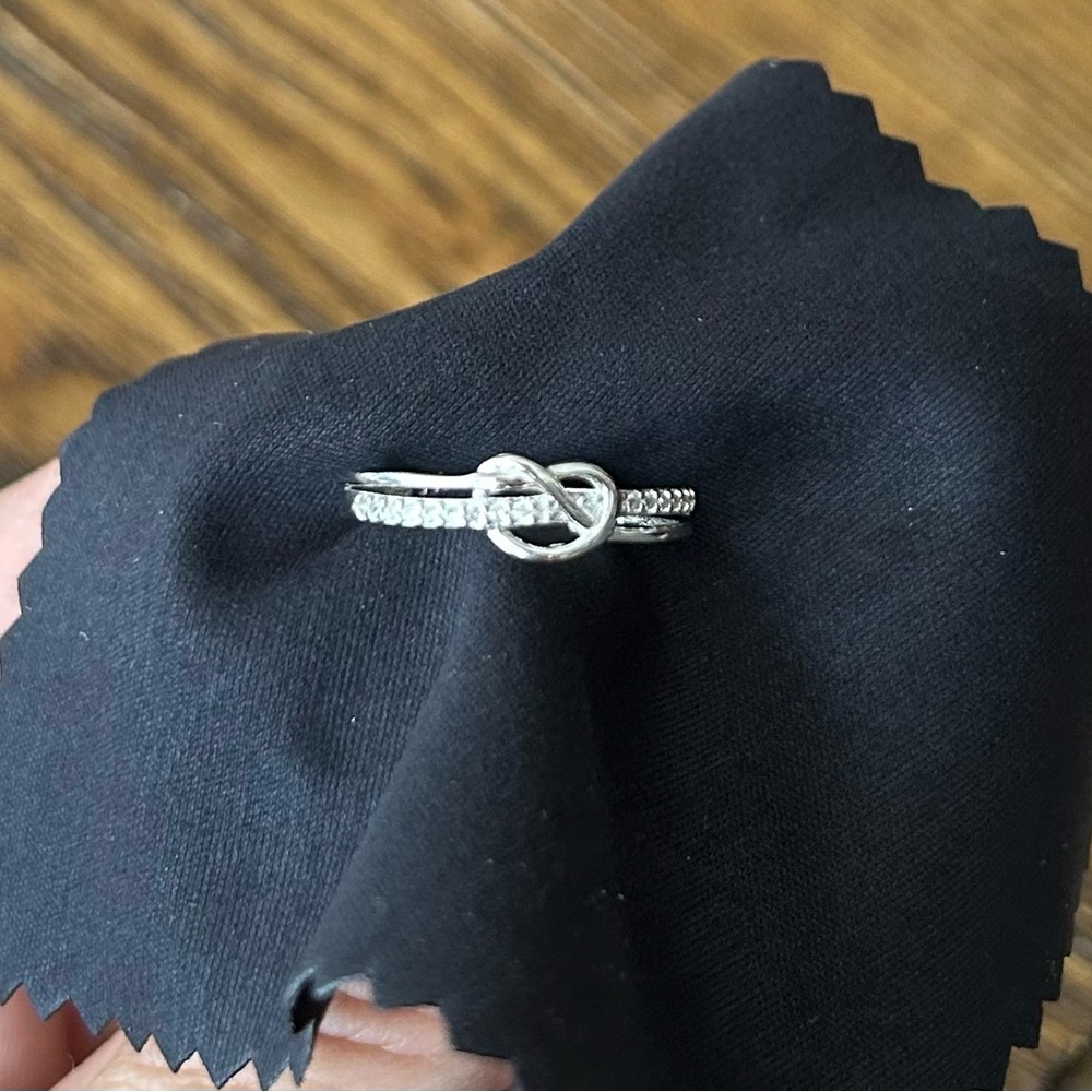Pair of Silver Infinity Knot Rings with CZ Diamonds